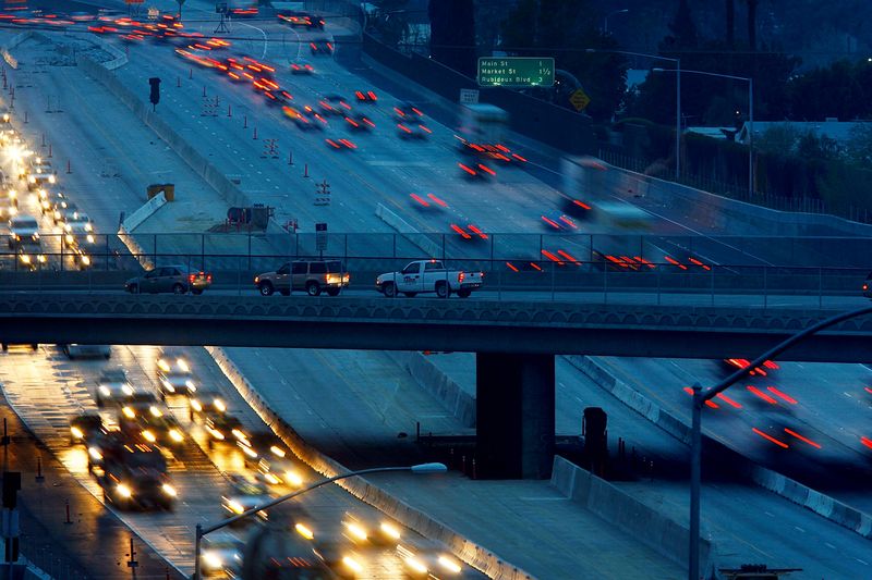 Morning rush-hour traffic moves along the 60 freeway on March 14, 2008 in Riverside, California. (David McNew/Getty Images)